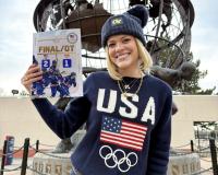 McLain Broussard outside of the United States Olympic and Paralympic Committee headquarters in Colorado Springs, Colorado, with one of her graphics from the 2026 Milan Cortina Winter Olympics. Submitted photo.