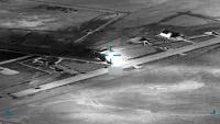  black and white aerial view of an airfield AI is helping U.S. forces find and choose targets in Iran, like this airfield. U.S. Central Command via AP